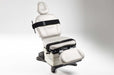 white medical chair with black security straps