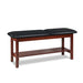 a classic medical table with shelf,  black upholstery and dark cherry base color