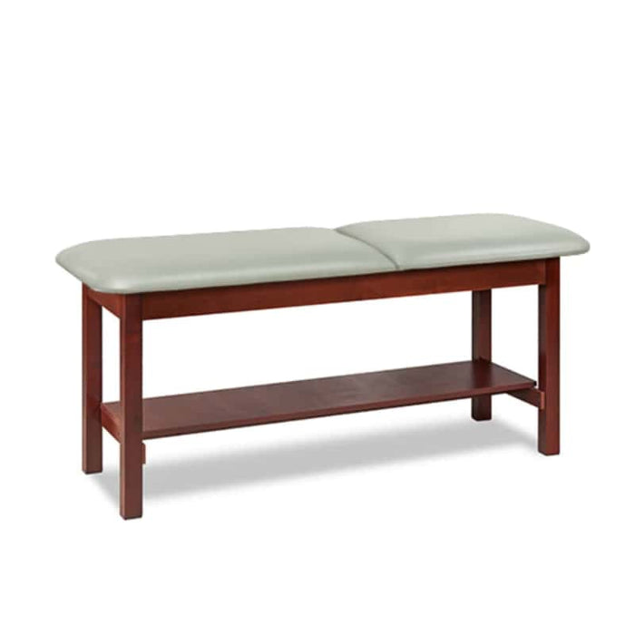 a classic medical table with shelf,  country mist upholstery and dark cherry base color