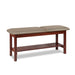a classic medical table with shelf,  warm gray upholstery and dark cherry base color