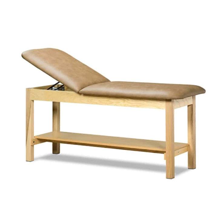 a classic medical table with shelf,  desert tan upholstery and natural base color