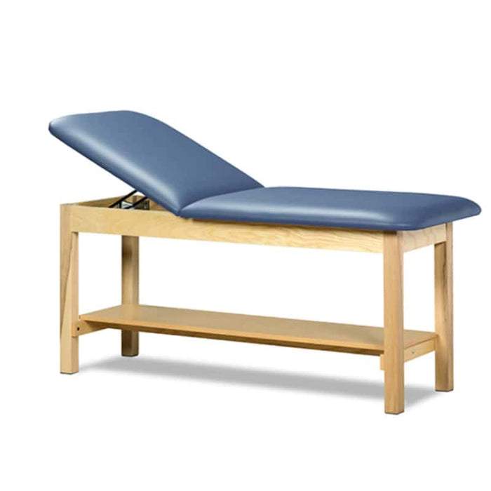 a classic medical table with shelf,  wedgewood upholstery and natural base color