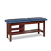 a classic medical table with shelving,  royal blue upholstery and dark cherry base color