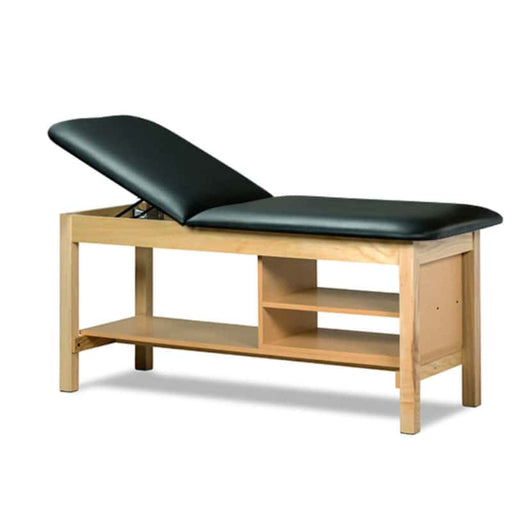 a classic medical table with shelving,  black upholstery and natural base color