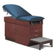 A medical examination table with drawers and patient step stool, royal blue upholstery and dark cherry base color