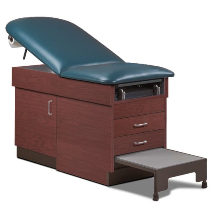 A medical examination table with drawers and patient step stool, slate blue upholstery and dark cherry base  color