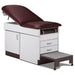 A medical examination table with drawers and patient step stool, burgundy upholstery and gray base color