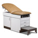 A medical examination table with drawers and patient step stool, desert tan upholstery and gray base color