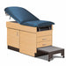 A medical examination table with drawers and patient step stool, royal blue upholstery and maple base color