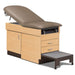 A medical examination table with drawers and patient step stool, warm gray upholstery and maple base color